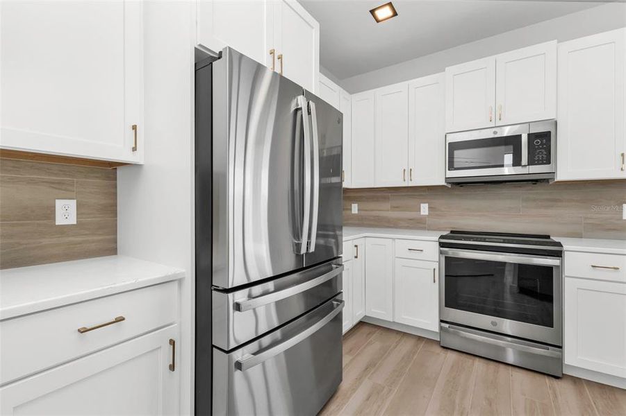 Furnished interior view inside a new home in , Port Charlotte (Image 13). Furnished interior view inside a new home in , Port Charlotte (Image 13).