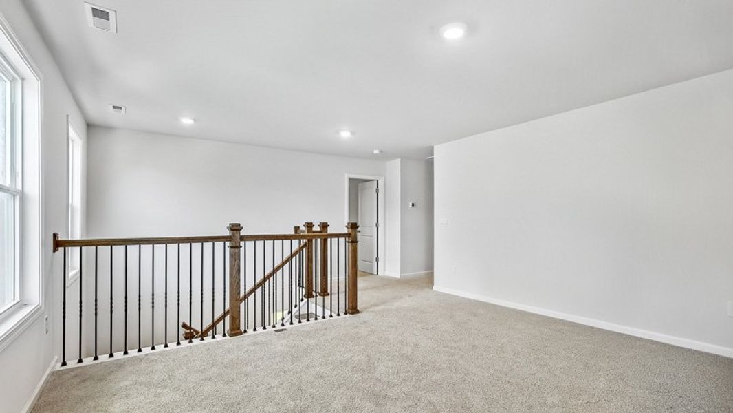 Representative unfurnished interior of a home built from the Edisto by D.R. Horton in Horton Park, Apex (Image 16).
