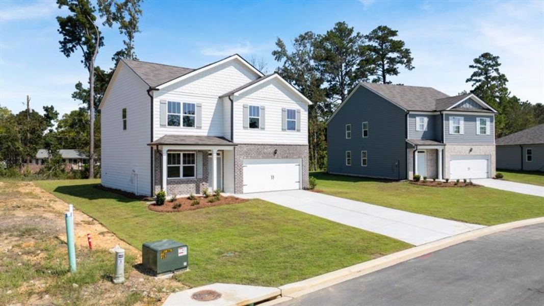 Front exterior of a new home in Northberry, Rome, GA, highlighting curb appeal (Image 1). Front exterior of a new home in Northberry, Rome, GA, highlighting curb appeal (Image 1).