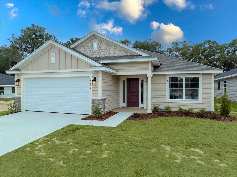 Front exterior of a new home in Briarwood, Alachua, FL, highlighting curb appeal (Image 24).