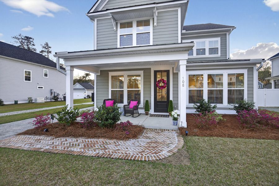 Exterior details and patio area of a home in Pineland Village, Summerville (Image 32).