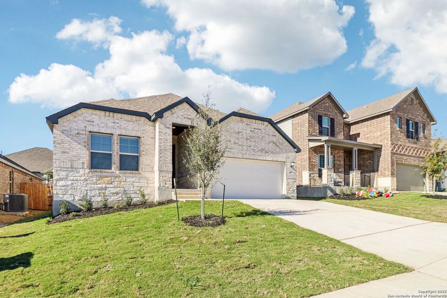Front exterior of a new home in Arcadia Ridge - Classic Series, San Antonio, TX, highlighting curb appeal (Image 25).