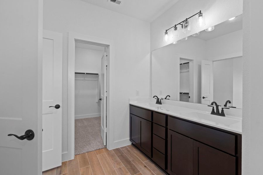 Furnished interior view inside a new home in Meridiana, Iowa Colony (Image 7). Furnished interior view inside a new home in Meridiana, Iowa Colony (Image 7).