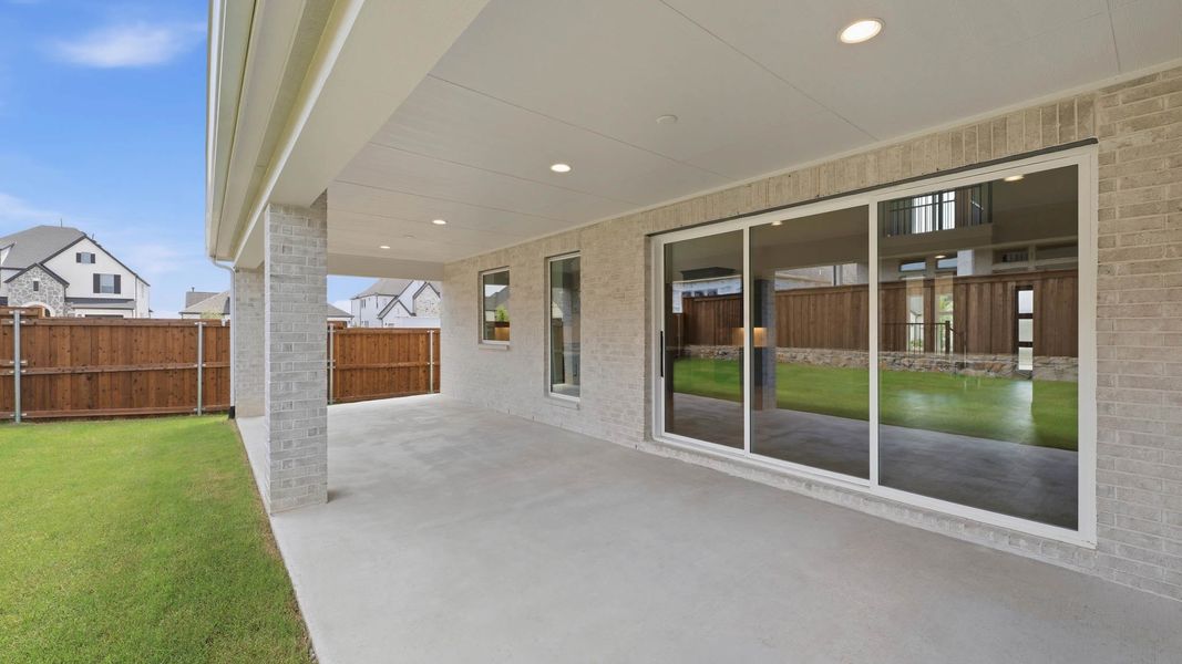 Exterior details and patio area of a home in Terraces, Rockwall (Image 3). Exterior details and patio area of a home in Terraces, Rockwall (Image 3).