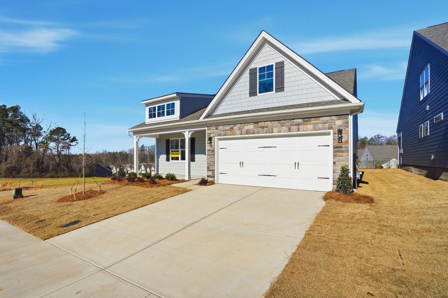 Front exterior of a new home in Villas at Prestwick, Mooresville, NC, highlighting curb appeal (Image 24).