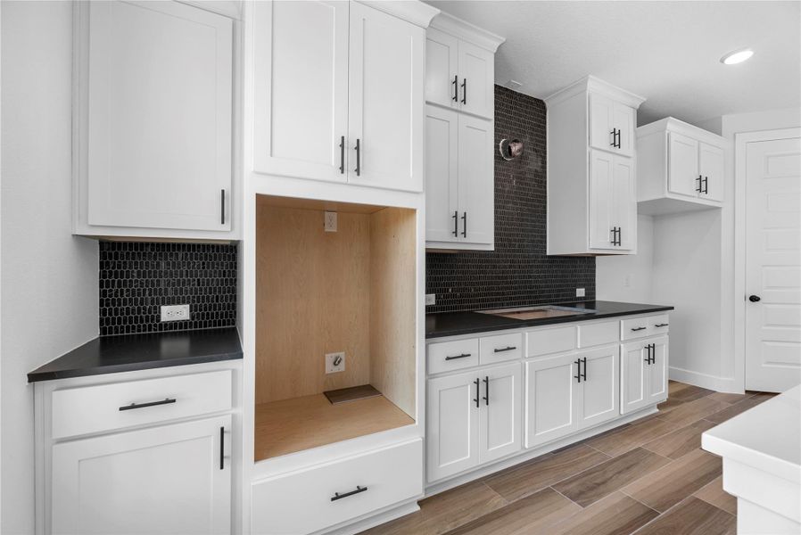 Furnished interior view inside a new home in Grand Central Park, Conroe (Image 7).
