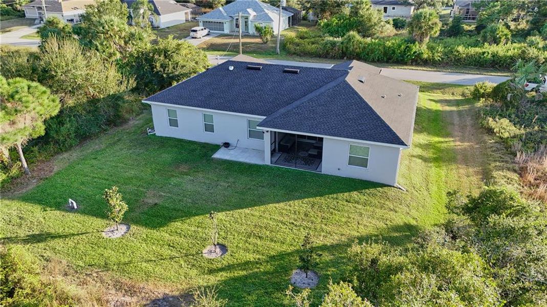 Exterior details and patio area of a home in , North Port (Image 32).