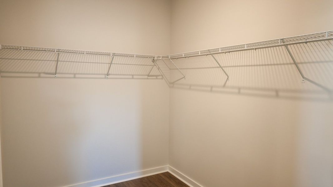 Representative unfurnished interior of a home built from the TISDALE by D.R. Horton in Harvest Point, Spring Hill (Image 37).