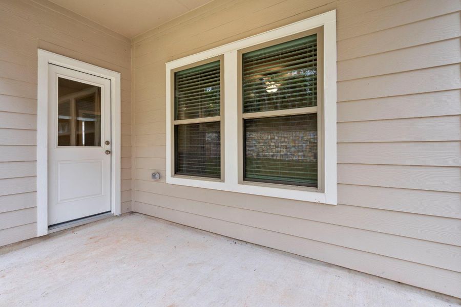 Exterior details and patio area of a home in Westridge Cove 50', Panorama Village (Image 3).