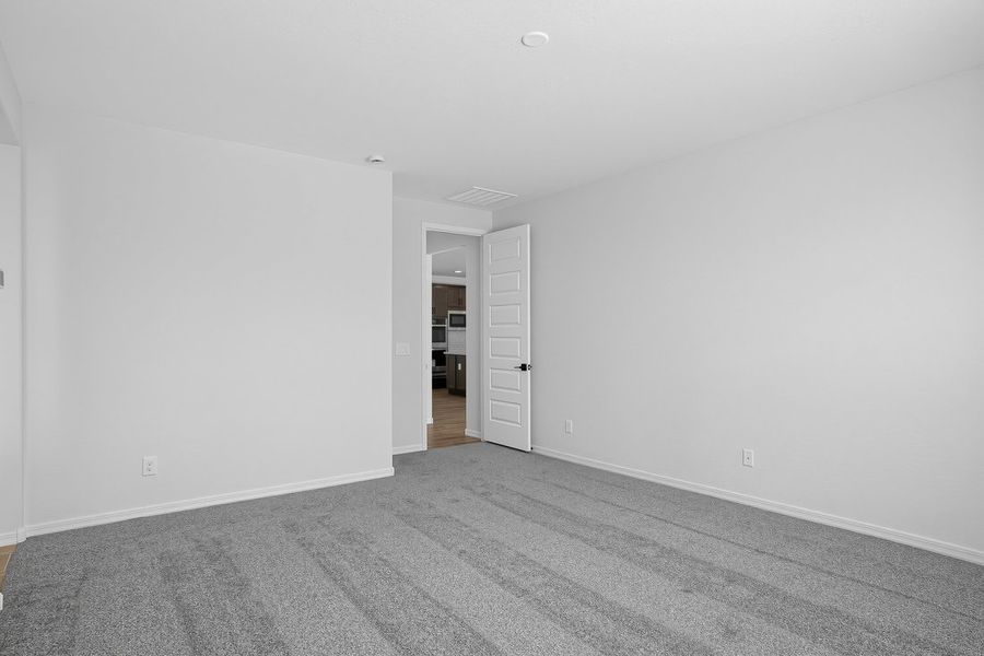 Spacious, unfurnished interior of a new home in Artisan at Asante, Surprise (Image 14).