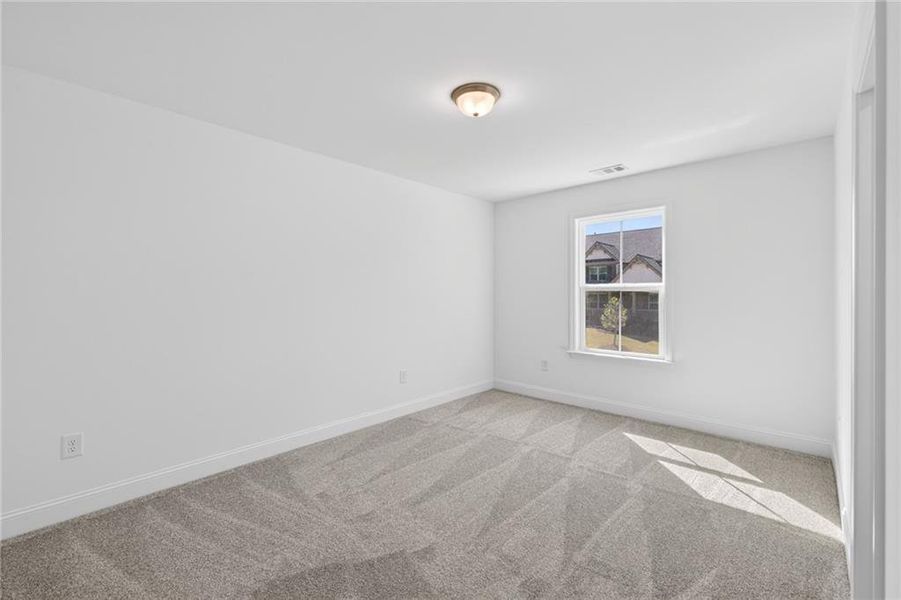 Spacious, unfurnished interior of a new home in Riversprings, Dacula (Image 53).