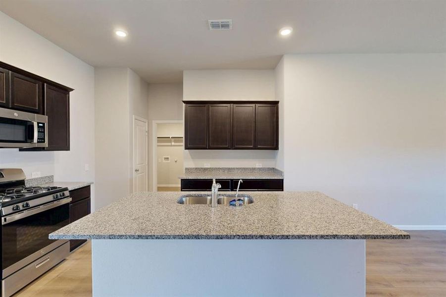 Furnished interior view inside a new home in Kings Way, Denton (Image 9).
