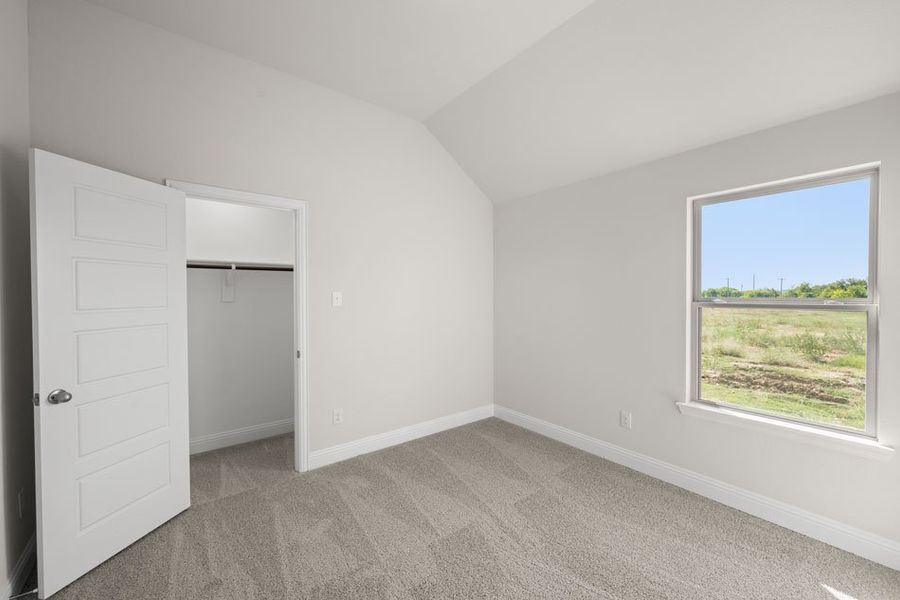 Front exterior of a new home in Still Water Lake, Godley, TX, highlighting curb appeal (Image 13). Front exterior of a new home in Still Water Lake, Godley, TX, highlighting curb appeal (Image 13).