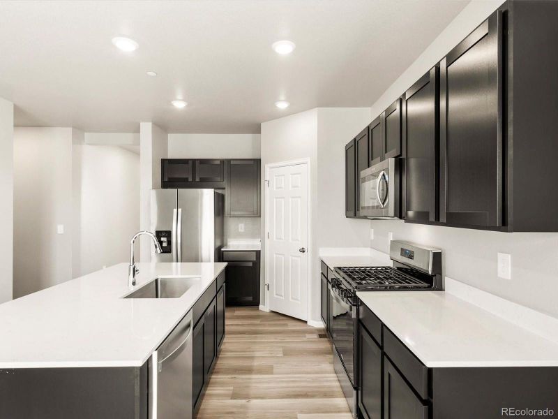 Furnished interior view inside a new home in , Commerce City (Image 8).