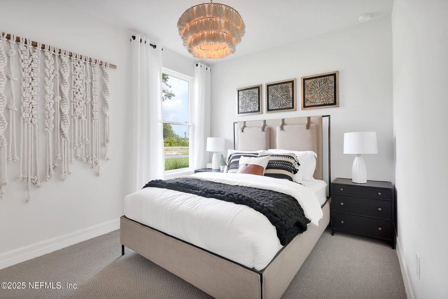 Furnished interior view inside a new home in Del Webb Wildlight, Yulee (Image 5).