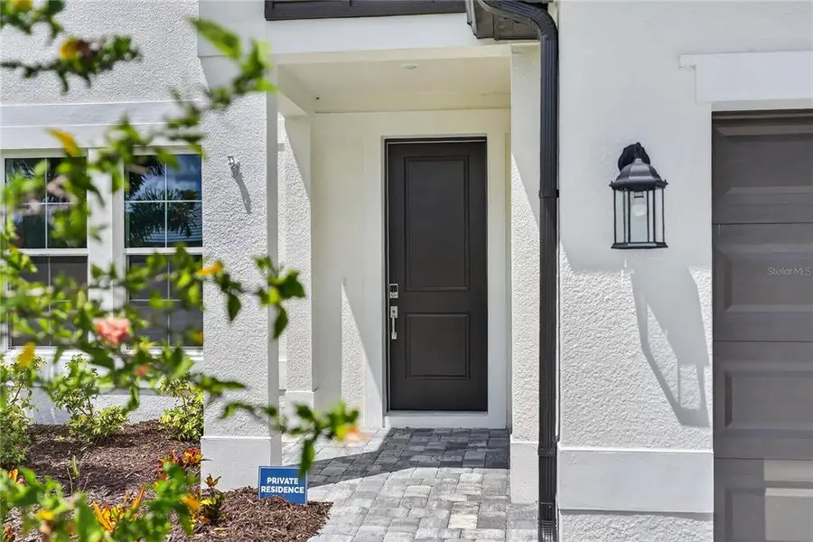 Exterior details and patio area of a home in , Sarasota (Image 3).