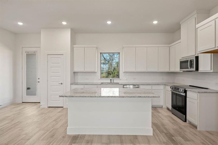 Furnished interior view inside a new home in Saddleback Estates, Boyd (Image 12).