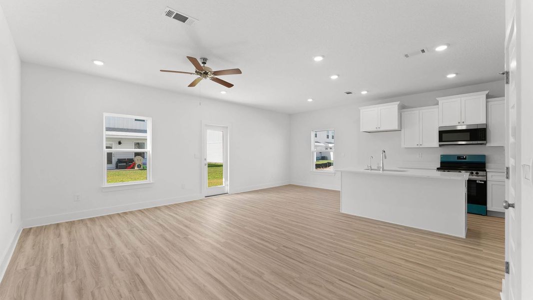 Representative unfurnished interior of a home built from the Sabal Exterior Unit by D.R. Horton in Chateau Nemours, Port Saint Joe (Image 11). Representative unfurnished interior of a home built from the Sabal Exterior Unit by D.R. Horton in Chateau Nemours, Port Saint Joe (Image 11).