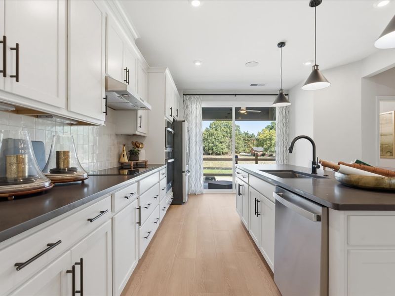 Representative furnished interior of a home built from the Dahlia by Tri Pointe Homes in Bellflower, Charlotte (Image 11).