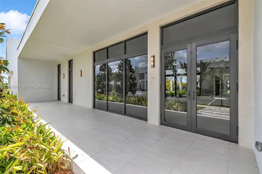 Exterior details and patio area of a home in , Weston (Image 3).