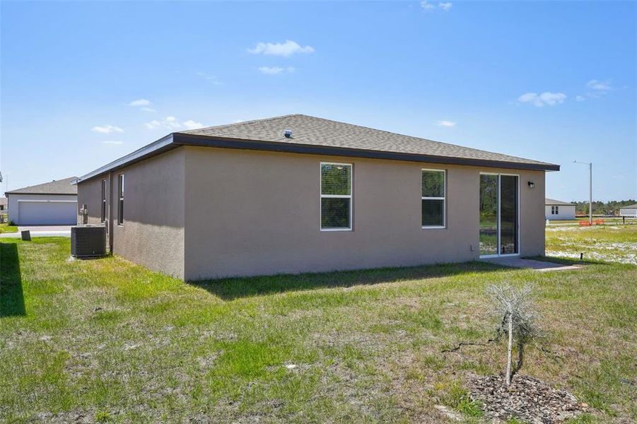 Exterior details and patio area of a home in Lake Deer Estates - Signature Series, Poinciana (Image 20). Exterior details and patio area of a home in Lake Deer Estates - Signature Series, Poinciana (Image 20).