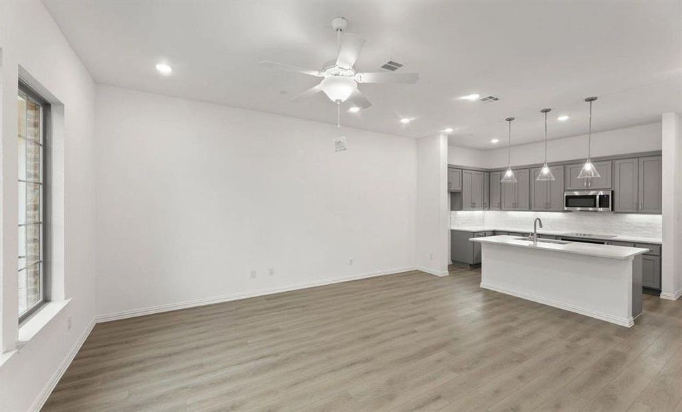 Open Kitchen-Living-Dining Room Representative Photo featuring the Milan Collection