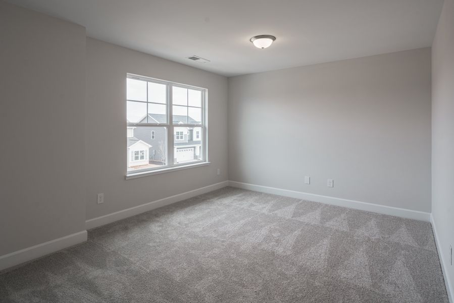 Representative unfurnished interior of a home built from the The McKee Manor by Cothran Homes in Holly Ridge, Greenville (Image 41). Representative unfurnished interior of a home built from the The McKee Manor by Cothran Homes in Holly Ridge, Greenville (Image 41).