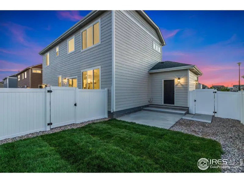 Front exterior of a new home in , Wellington, CO, highlighting curb appeal (Image 22).