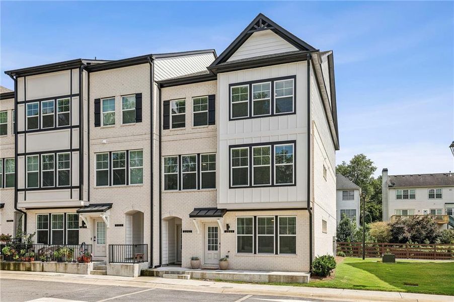 Front exterior of a new home in Town Center Overlook, Peachtree Corners, GA, highlighting curb appeal (Image 29).