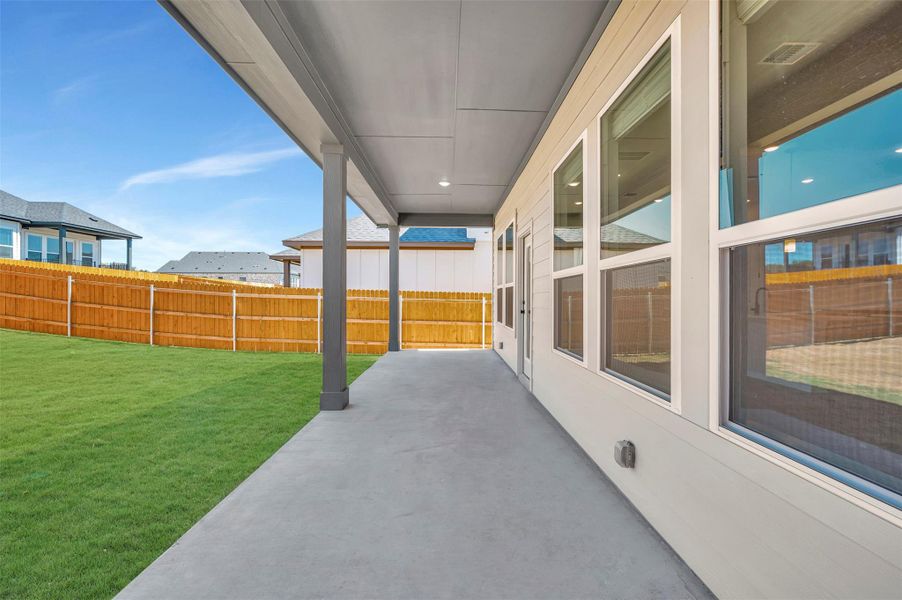 Exterior details and patio area of a home in Heritage, Dripping Springs (Image 3).
