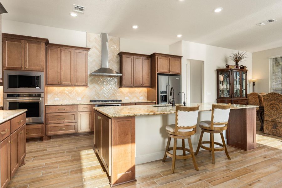 Look at all of the incredible storage and counter space! This kitchen is perfect for everyday cooking or entertaining. Look at all of the incredible storage and counter space! This kitchen is perfect for everyday cooking or entertaining.