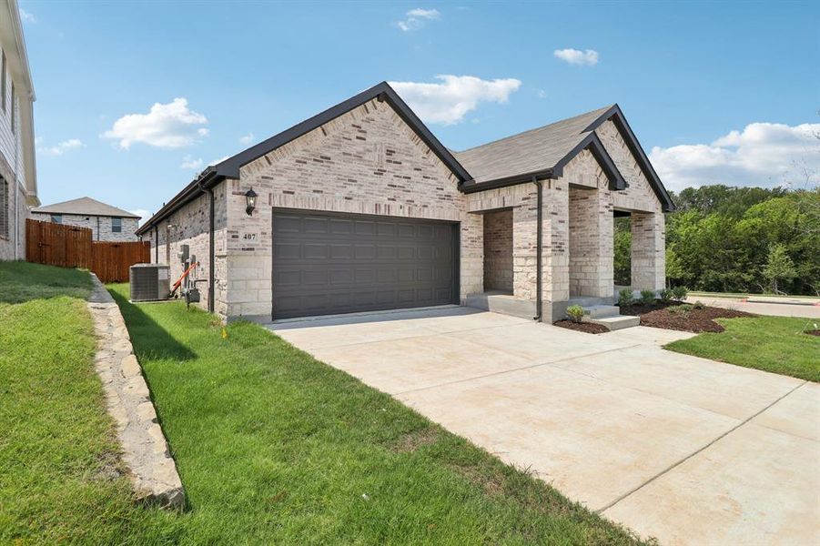 Front exterior of a new home in Simpson Crossing - Signature Series, McKinney, TX, highlighting curb appeal (Image 19).