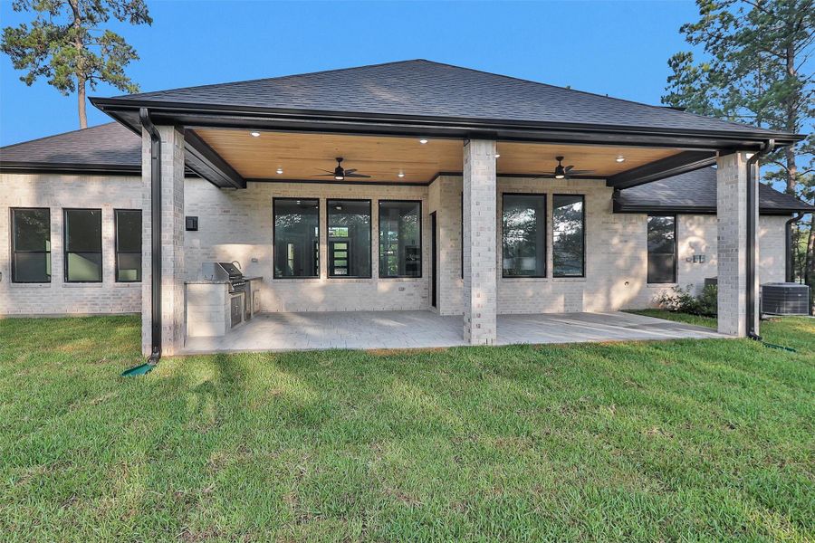Front exterior of a new home in , Montgomery, TX, highlighting curb appeal (Image 21). Front exterior of a new home in , Montgomery, TX, highlighting curb appeal (Image 21).