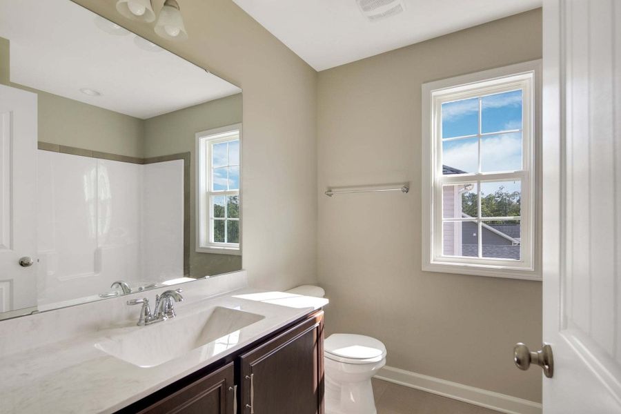 Representative furnished interior of a home built from the Clayton by Caviness & Cates Communities in Bartlett Manor, Youngsville (Image 214).