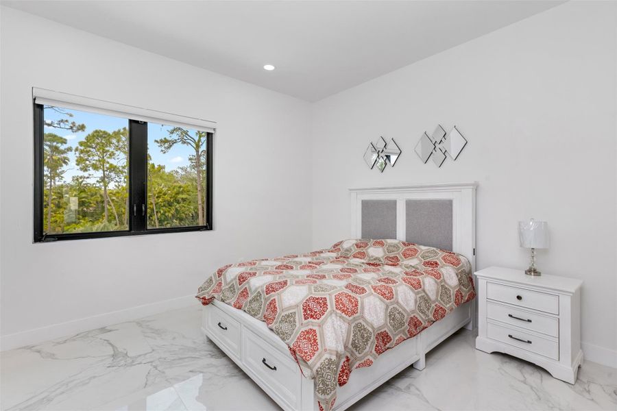 Furnished interior view inside a new home in , Parkland (Image 9).
