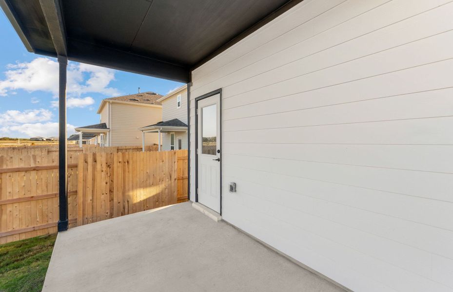 Exterior details and patio area of a home in Patterson Ranch, Georgetown (Image 27).