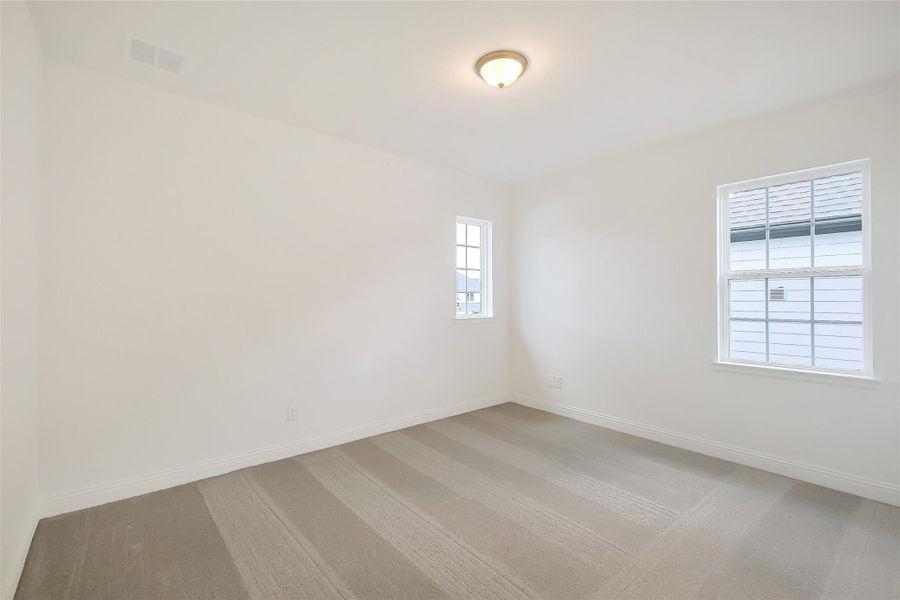 Spacious, unfurnished interior of a new home in Sienna 65', Missouri City (Image 31).