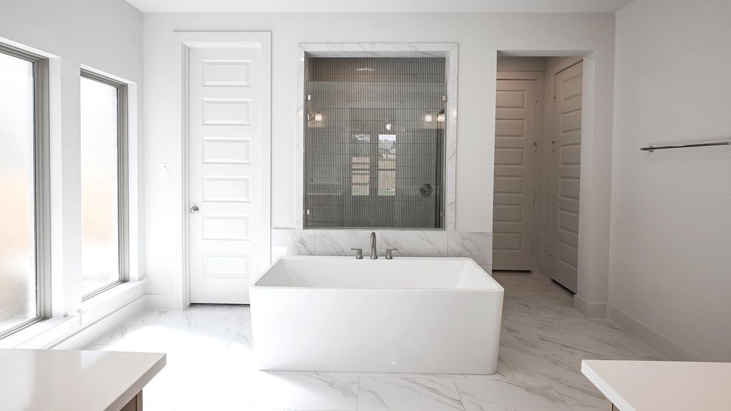 Furnished interior view inside a new home in 6 Creeks, Kyle (Image 5).