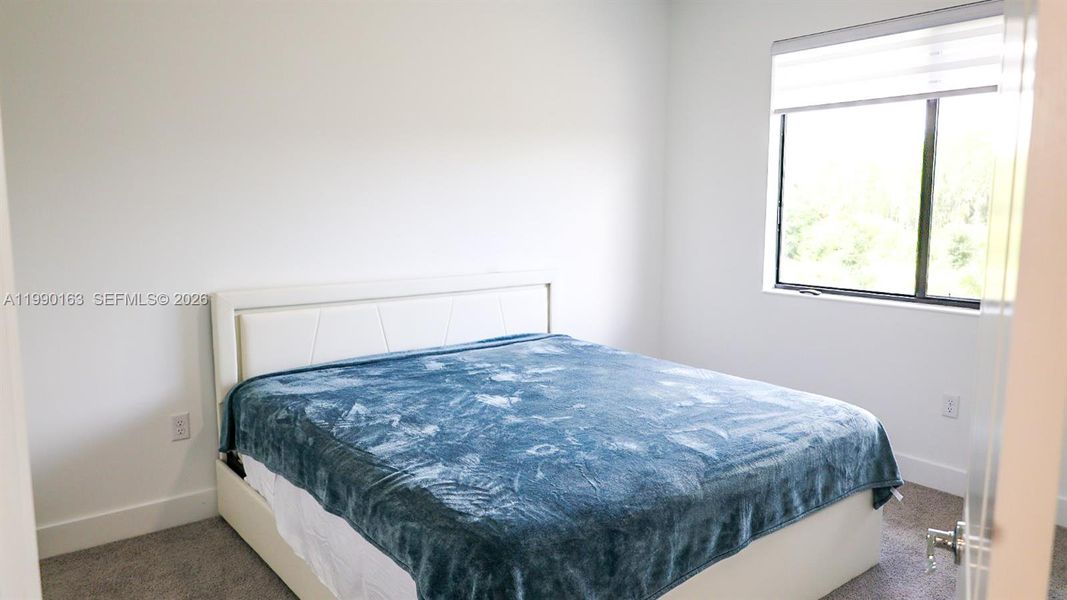 Furnished interior view inside a new home in , Ave Maria (Image 14).