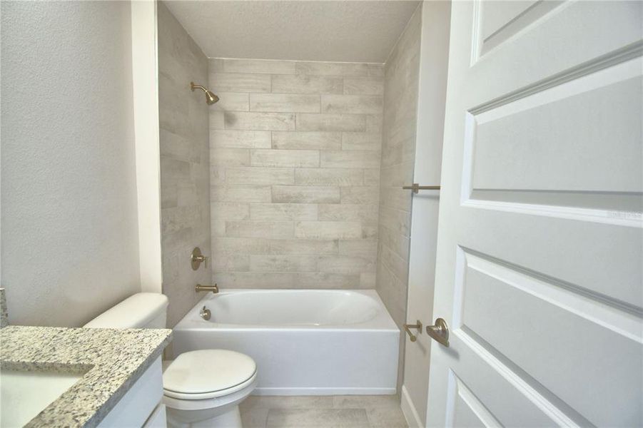 Furnished interior view inside a new home in Lake Juliana Estates, Auburndale (Image 9).