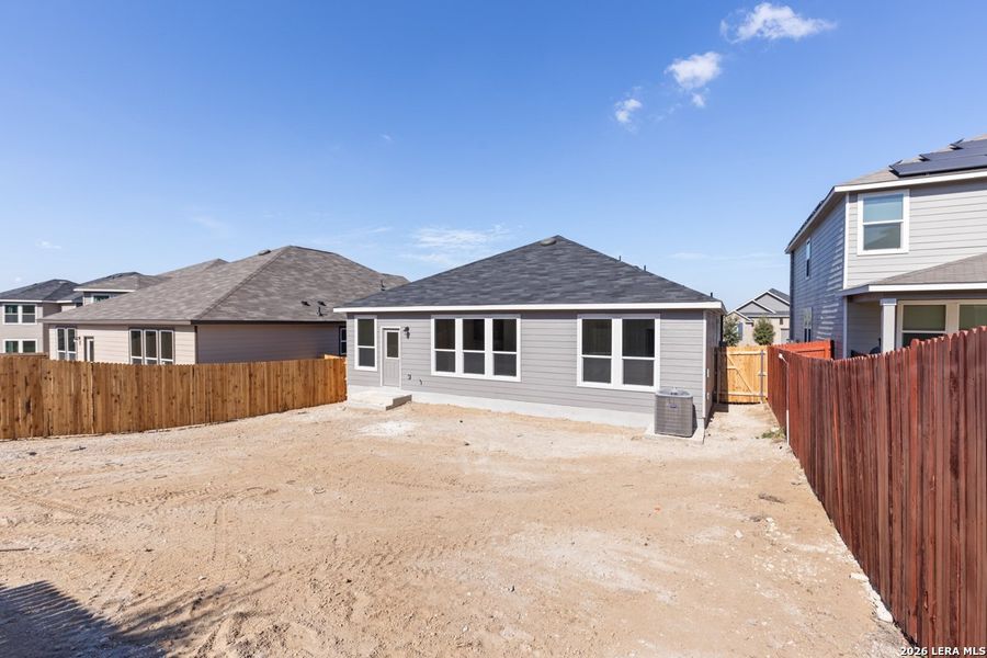Exterior details and patio area of a home in Hidden Bluffs at TRP, San Antonio (Image 3).