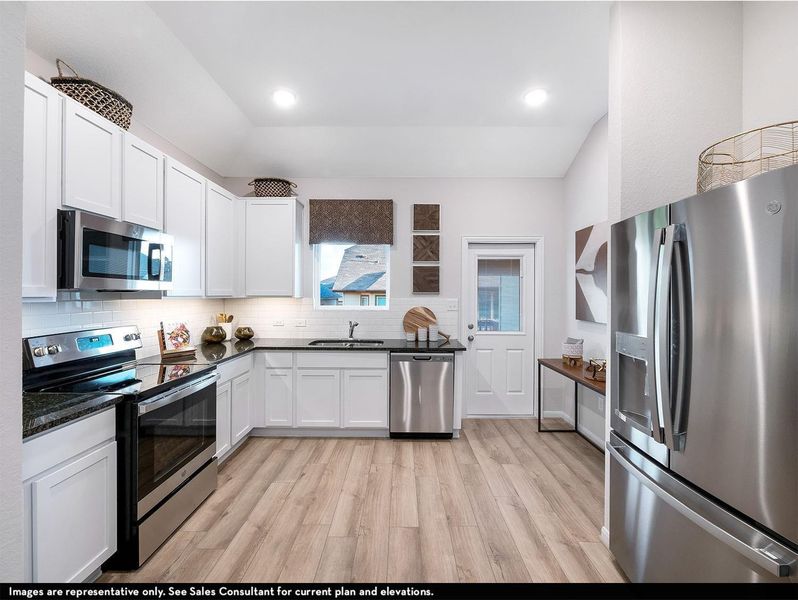 Bright, open kitchen features granite countertops, stainless steel gas appliances, 42-inch shaker cabinets, and a functional layout.**Photo is a representative only and may vary as built, real photos coming soon!** Bright, open kitchen features granite countertops, stainless steel gas appliances, 42-inch shaker cabinets, and a functional layout.**Photo is a representative only and may vary as built, real photos coming soon!**