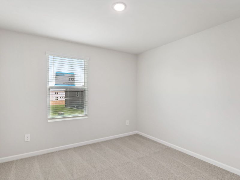 Spacious, unfurnished interior of a new home in River Glen, Angier (Image 21).