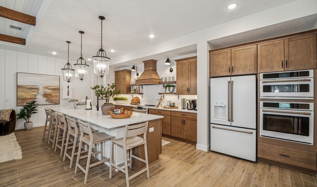 Kitchen with warm-toned cabinetry