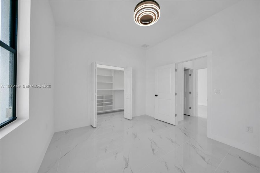 Spacious, unfurnished interior of a new home in , Lehigh Acres (Image 16). Spacious, unfurnished interior of a new home in , Lehigh Acres (Image 16).