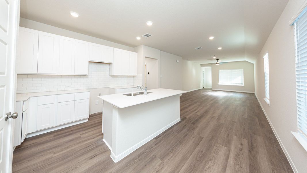 Kitchen to Dining Area and Family Room