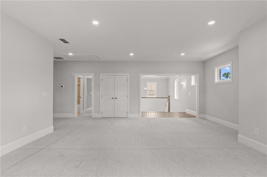 LOADS OF SPACE FOR A LARGE SECTIONAL FOR EVERYONE TO ENJOY HANGING OUT WATCHING A MOVE OR GAME DAY