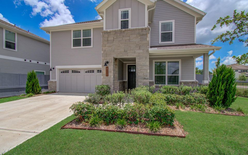 Front exterior of a new home in , Fulshear, TX, highlighting curb appeal (Image 22). Front exterior of a new home in , Fulshear, TX, highlighting curb appeal (Image 22).