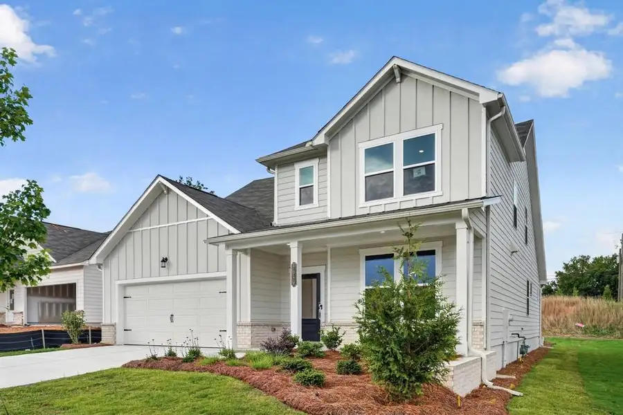 Front exterior of a new home in Weatherfield, Buford, GA, highlighting curb appeal (Image 20).