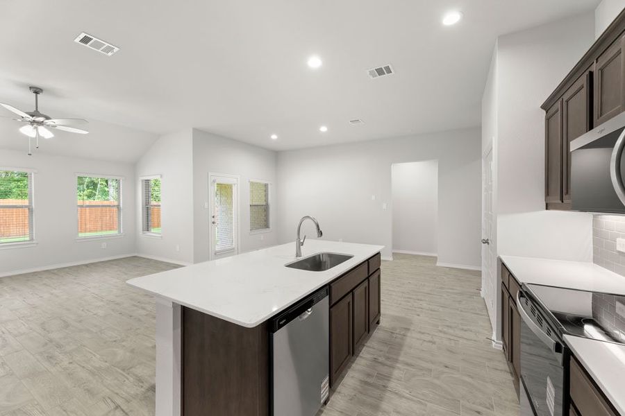 Representative exterior photo of a completed home built from the Boston by Impression Homes in Keeneland, Aubrey, TX (Image 10).